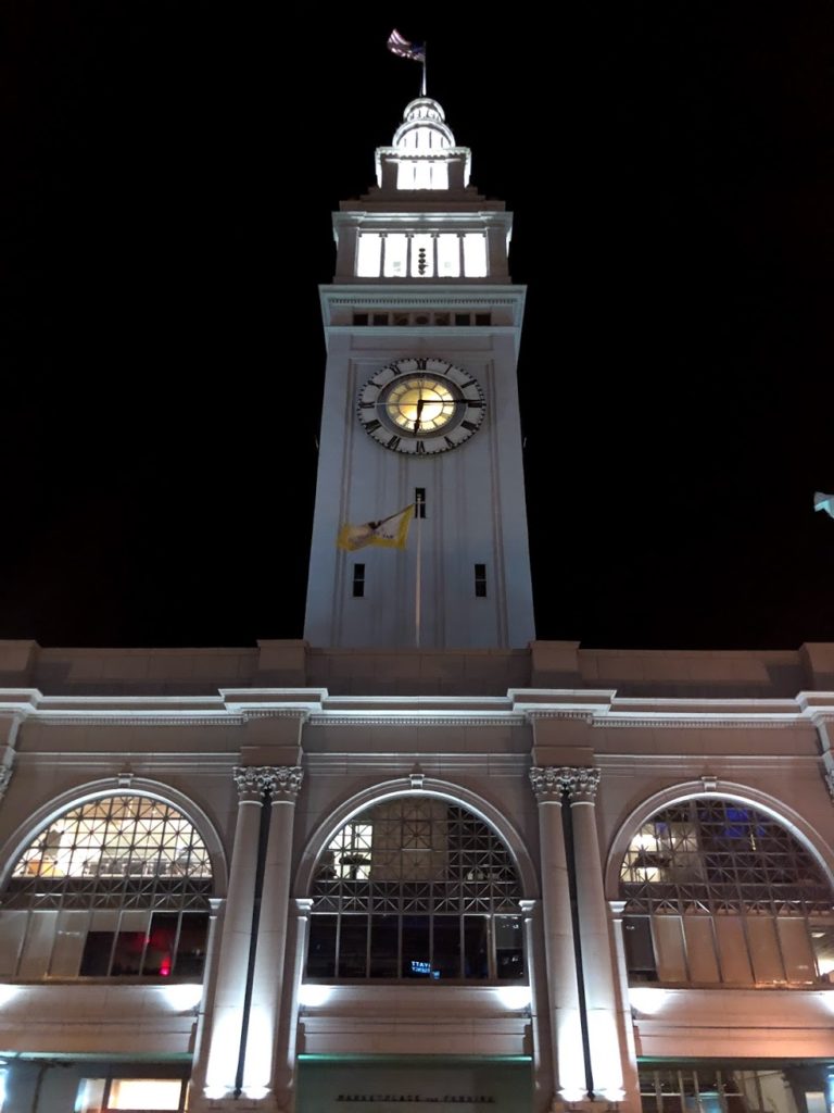The ferry building on the water in San Francisco.